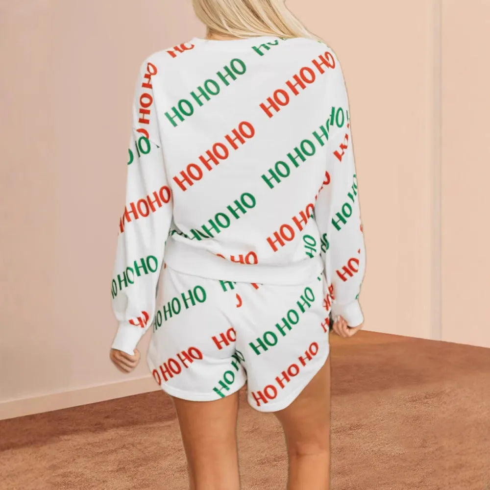 Women's white polyester two-piece suit with letter print, long sleeves, and fifth pants