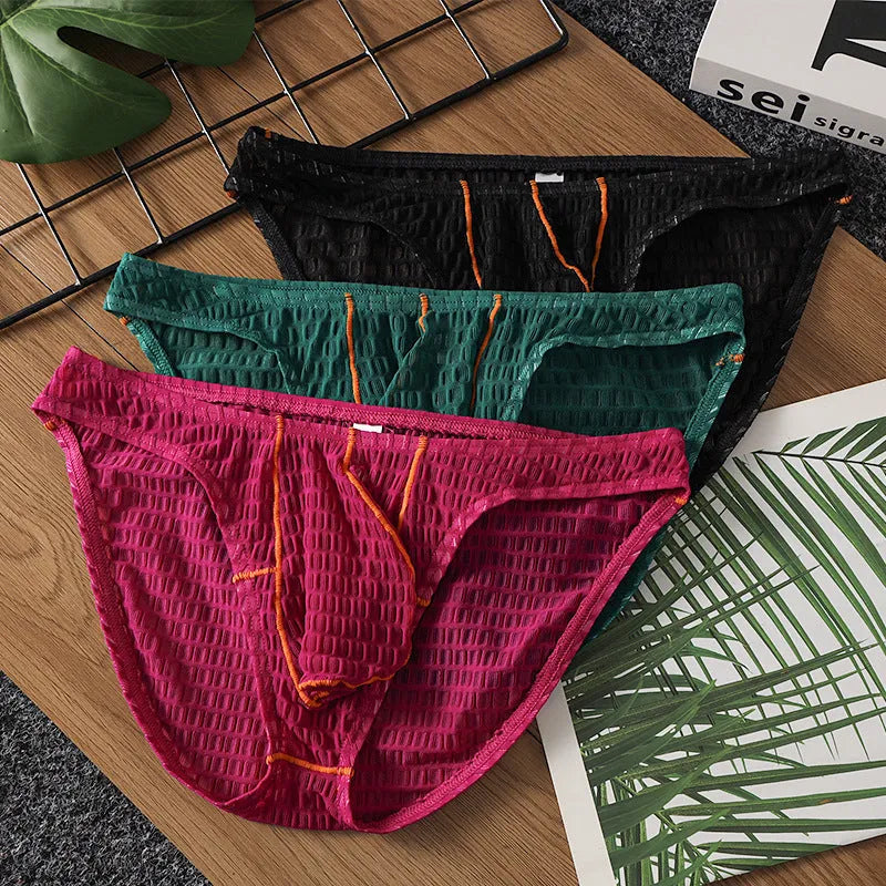 Men's low waist briefs in solid colour with ice silk fabric and lace trim details