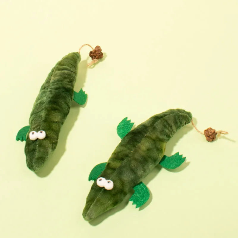 Green plush alligator cat toy with catnip and peppermint scent, shown at 30 cm scale.