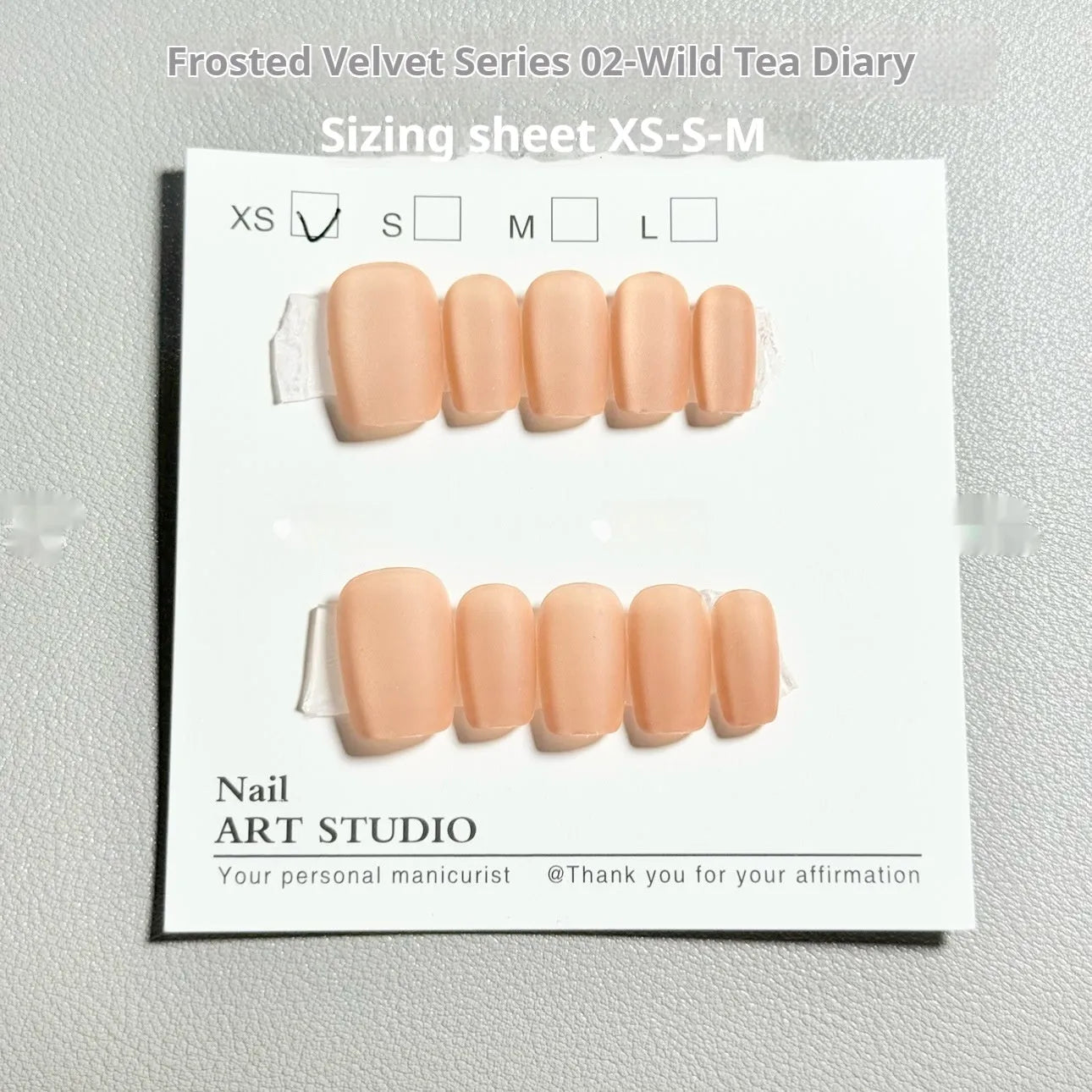 Frosted velvet Cat's Eye false nail art set in short ladder shape with XS, S, and M sizes.