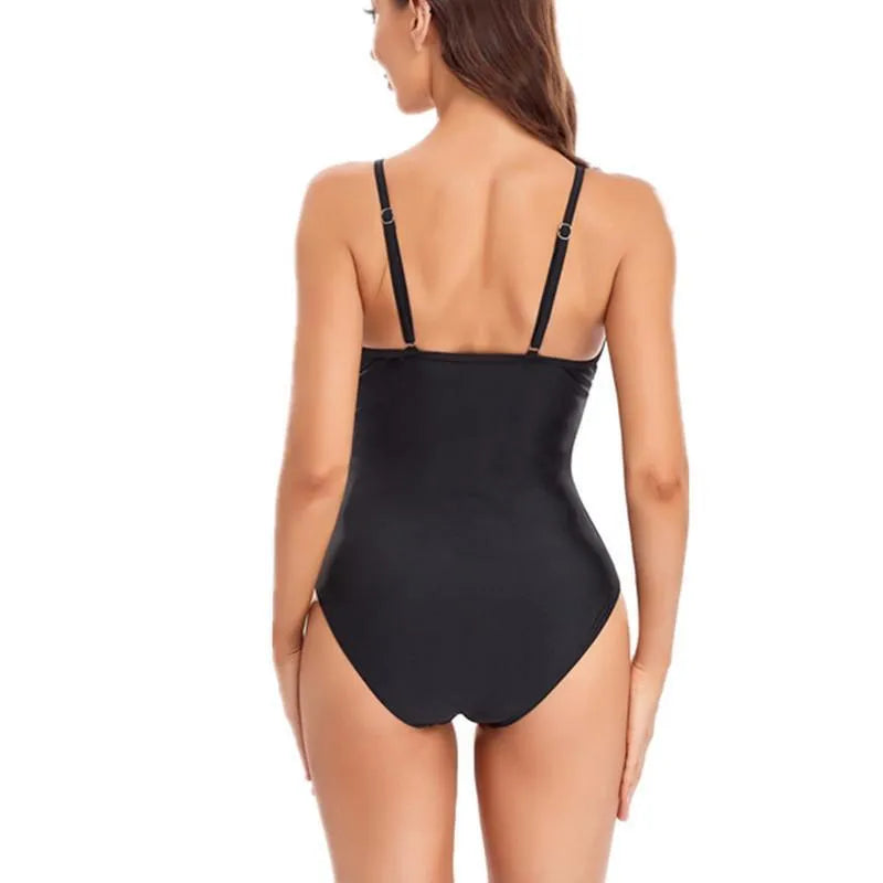 Ladies' solid colour backless one-piece swimsuit in black or blue, made from high-elasticity spandex.