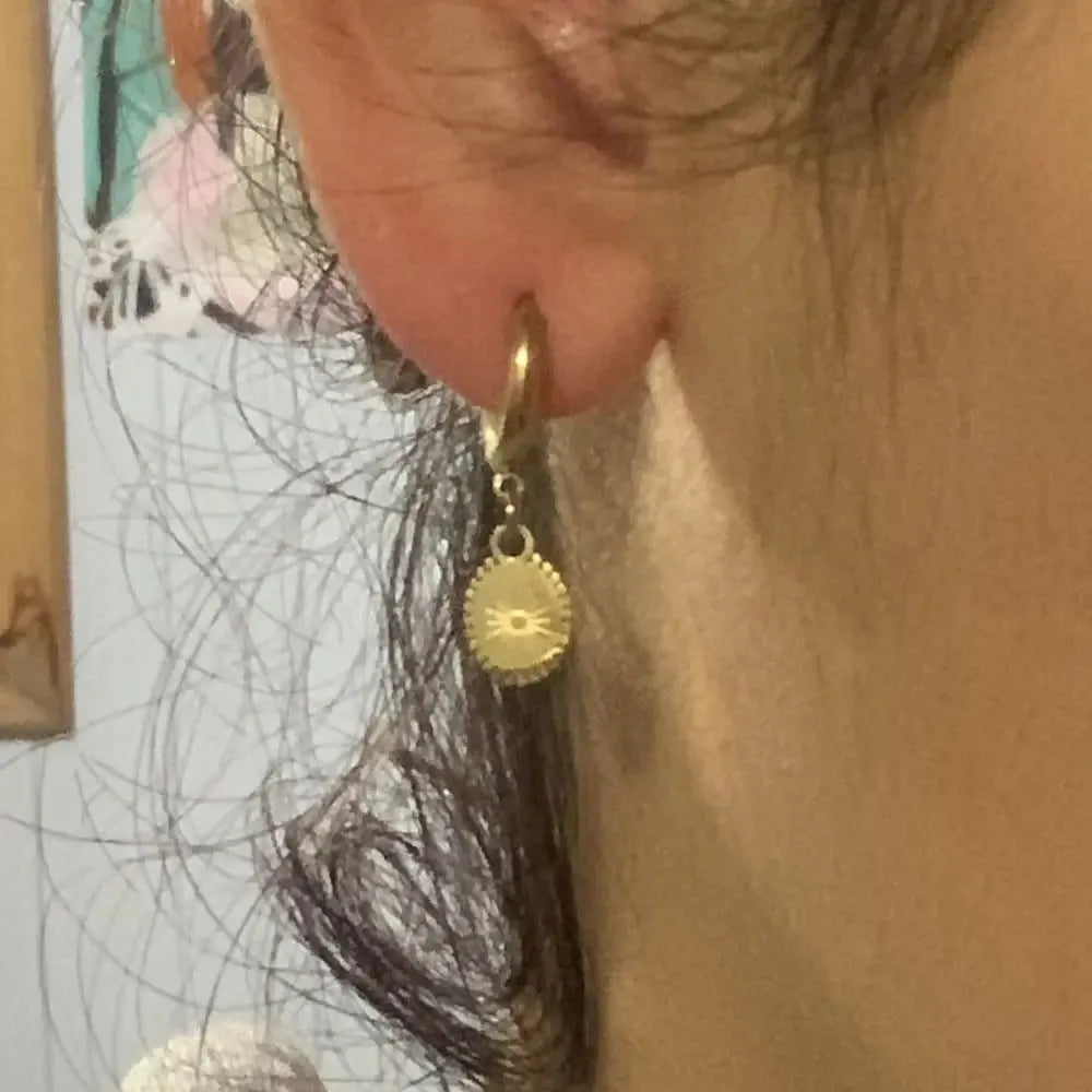 Stainless steel geometric women's ear studs in XY-EH005 colour with ellipse details.