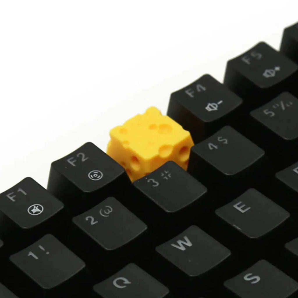 Yellow resin cheese-themed keycap for mechanical keyboards with detailed sculpting