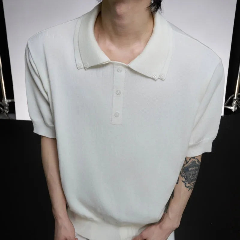 Man modelling a grey loose-fit polyester short-sleeve shirt with a double lapel collar design