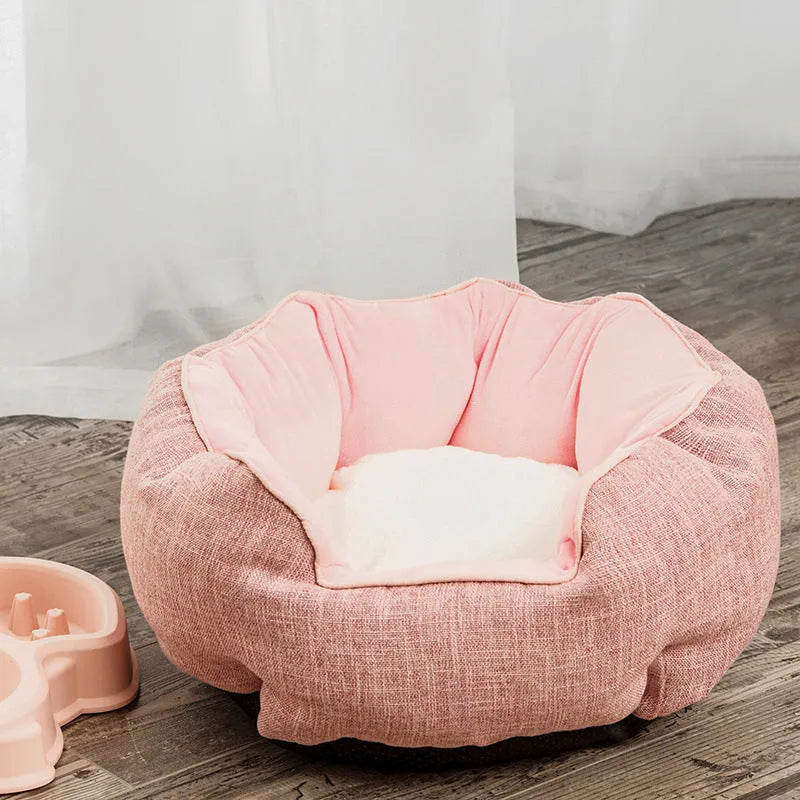 Blue octagonal pet bed with removable mat for a small dog or cat.