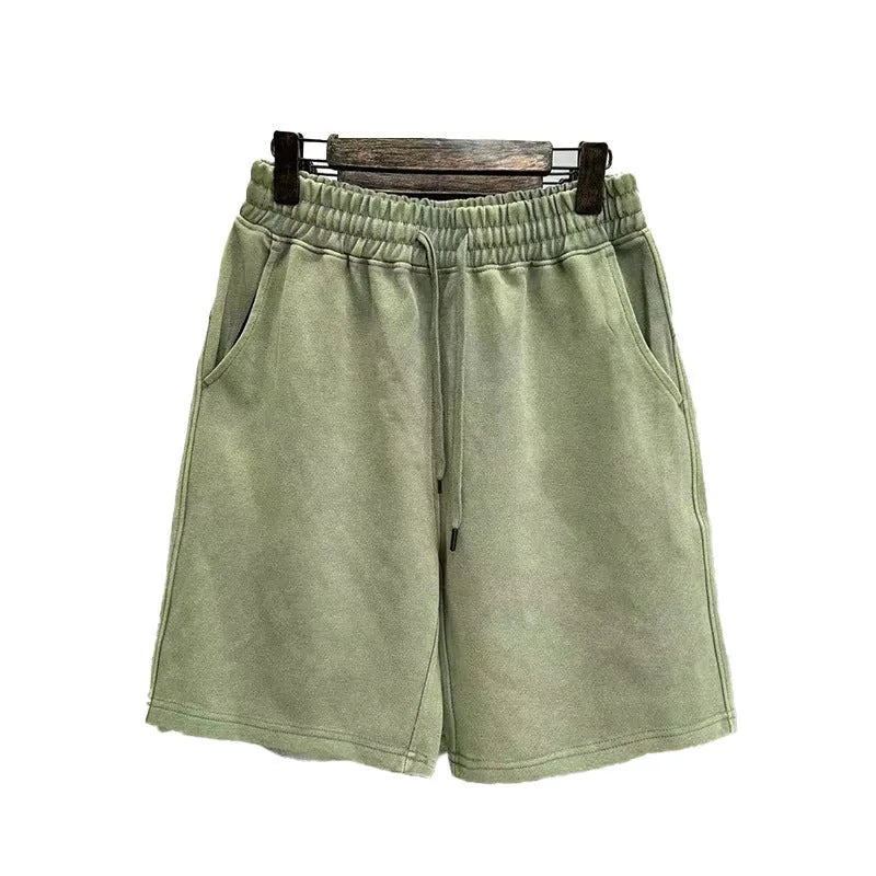 Men's distressed cotton shorts in straight cut loose casual style showing colour options