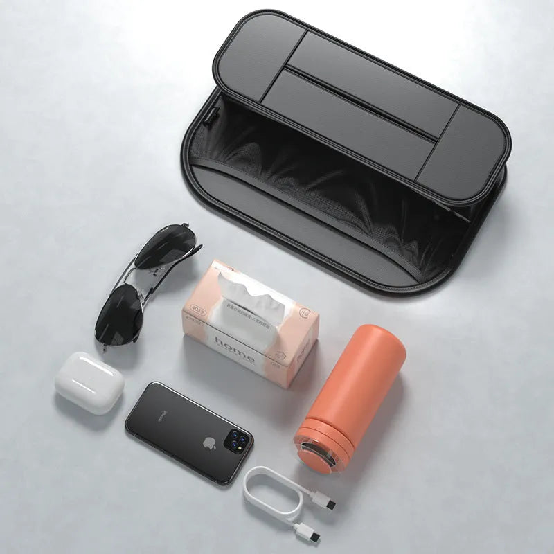 Black leather car seat rear storage bag showing dimensions and customisable pockets.