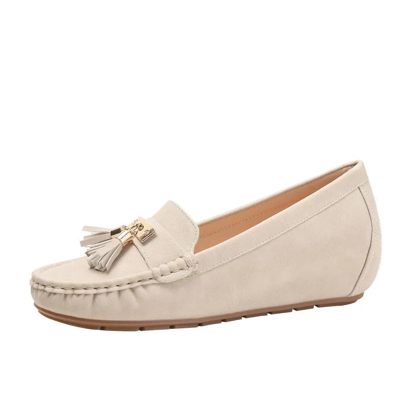 Flat heel height increasing insole shoe in milky white colour with round toe and slip-on design