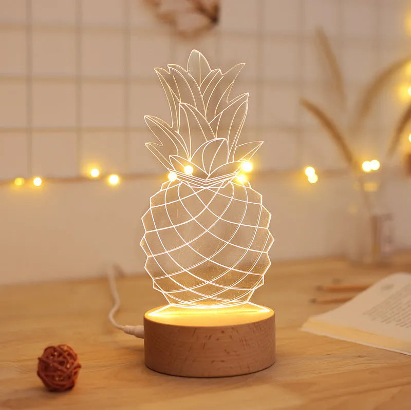 Wood and acrylic pineapple-shaped table lamp with dimmable LED light and USB power cable.
