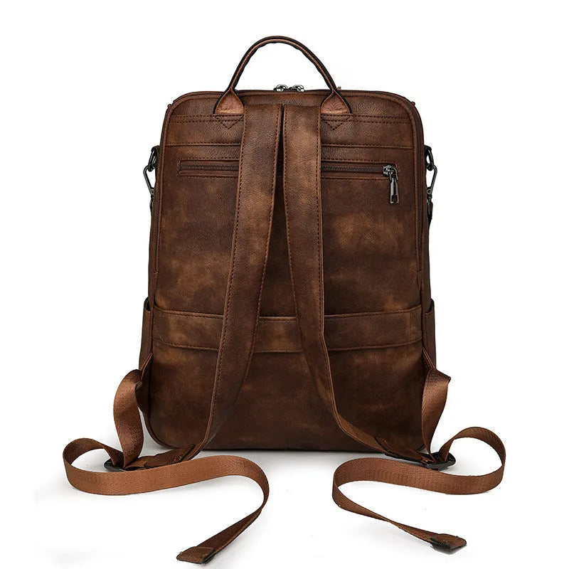 Retro college students backpack with curved shoulder straps in six colour options including black, blue, and yellow apricot