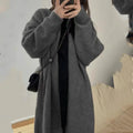 Loose knitted women's cardigan sweater in thick chenille fabric with 3D pattern and regular long sleeves