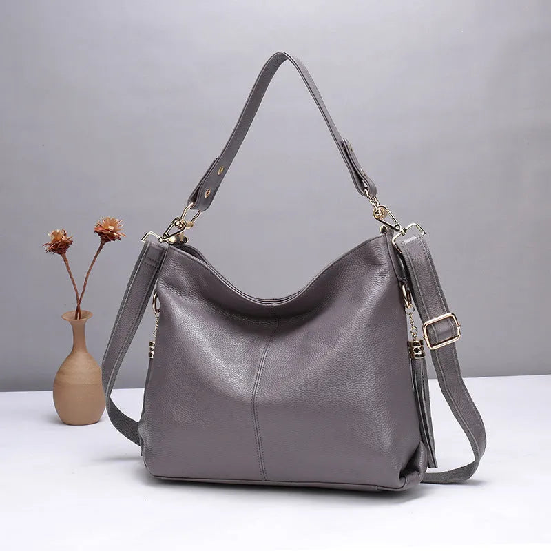 Genuine leather crossbody bag in vertical square shape with multiple internal compartments and four colour options