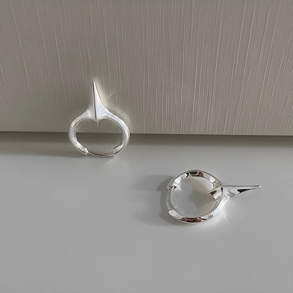 Platinum finished star geometric ear clips with copper construction for women