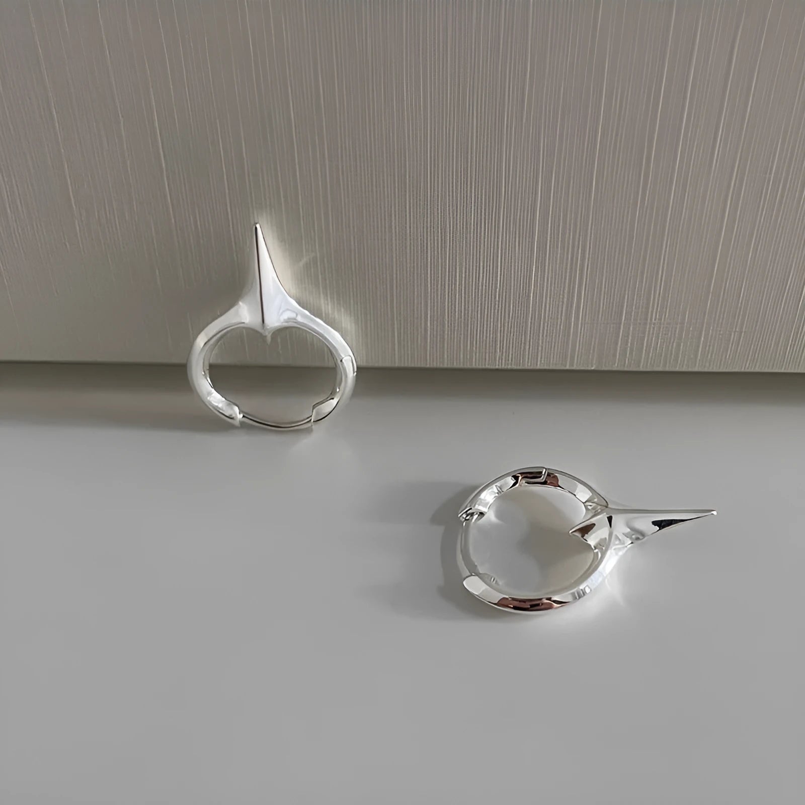 Platinum finished star geometric ear clips with copper construction for women