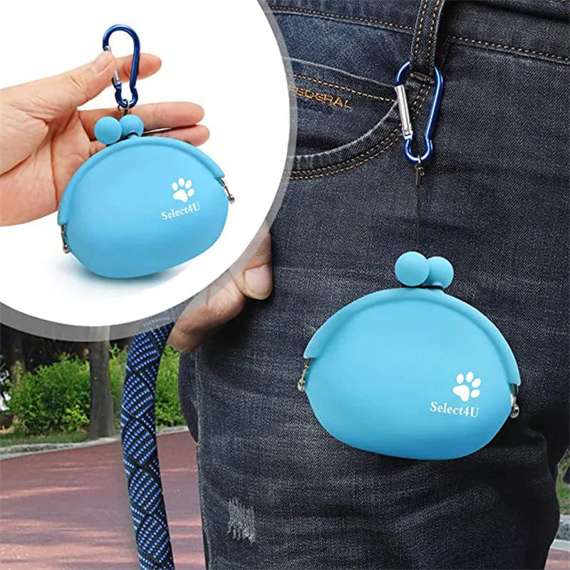 Yellow silicone dog training treat pouch with hook-and-loop waist strap, shown with dog biscuits.