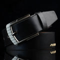 Men's imitation leather belt with pin buckle in black, brown or white colours showing retro pattern detailing
