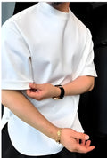 White men's cotton t-shirt with decorative buttons on the front and sleeves, showing a round hem.