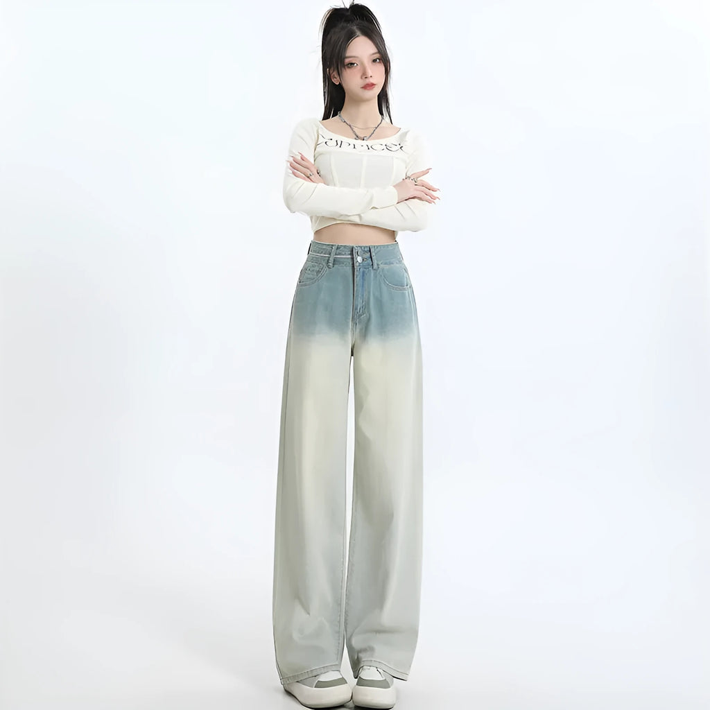 Women's gradient blue straight-leg denim trousers showing wider cut through thigh and calf