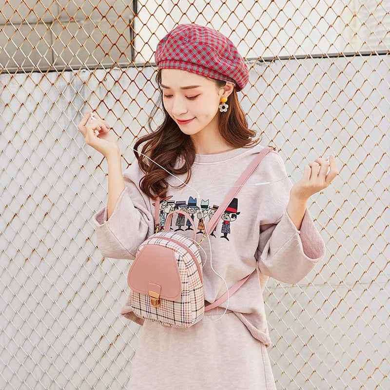 One shoulder diagonal phone bag in PU fabric available in black, blue, brown, pink, and red colours.