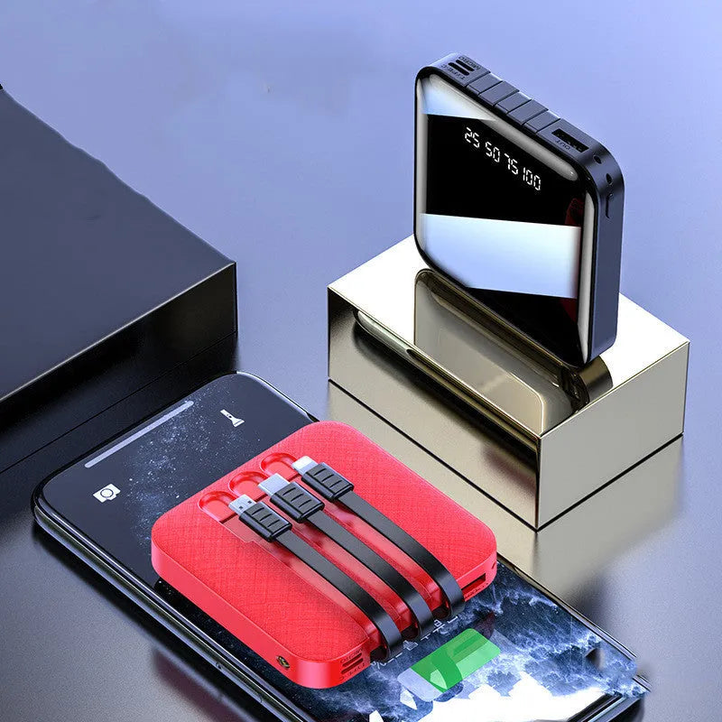 Black mirror-finish power bank with built-in three-in-one charging cable, showing 10000mAh capacity.