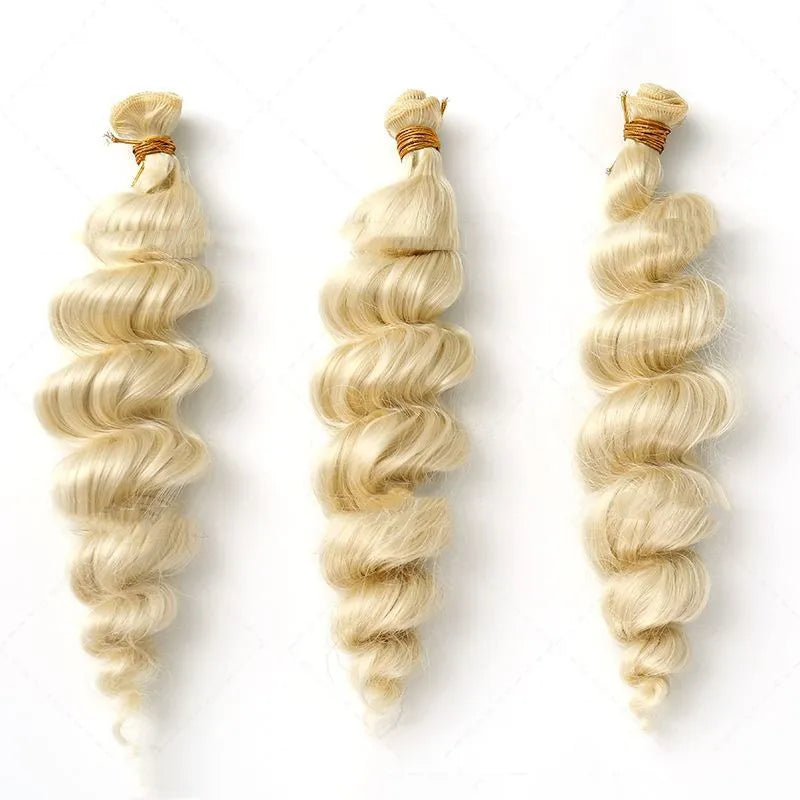 Golden synthetic wig for women on a stand, showing long, straight hair in a bright gold colour.