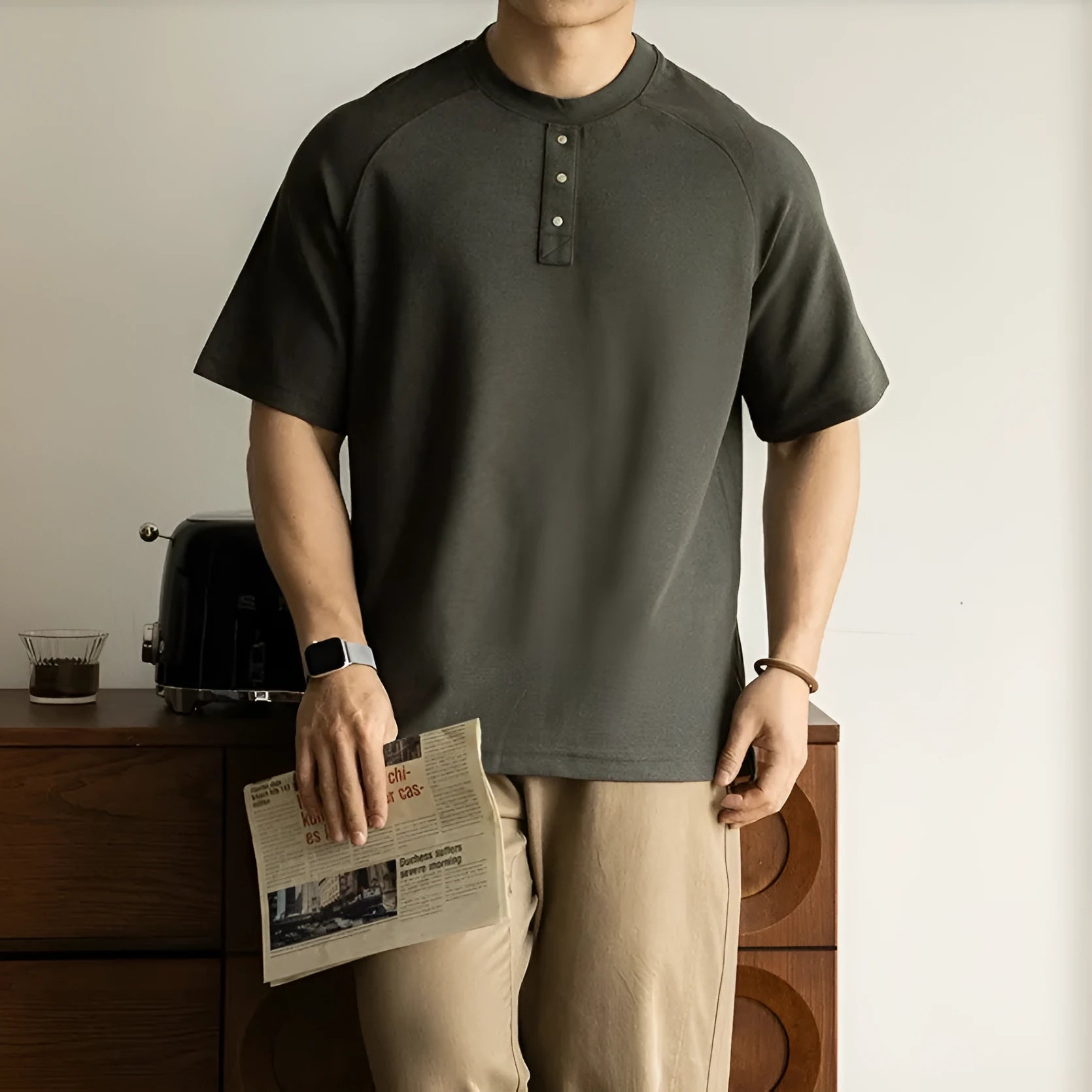 Women's casual gray pullover top with raglan sleeves and a terry texture fabric.