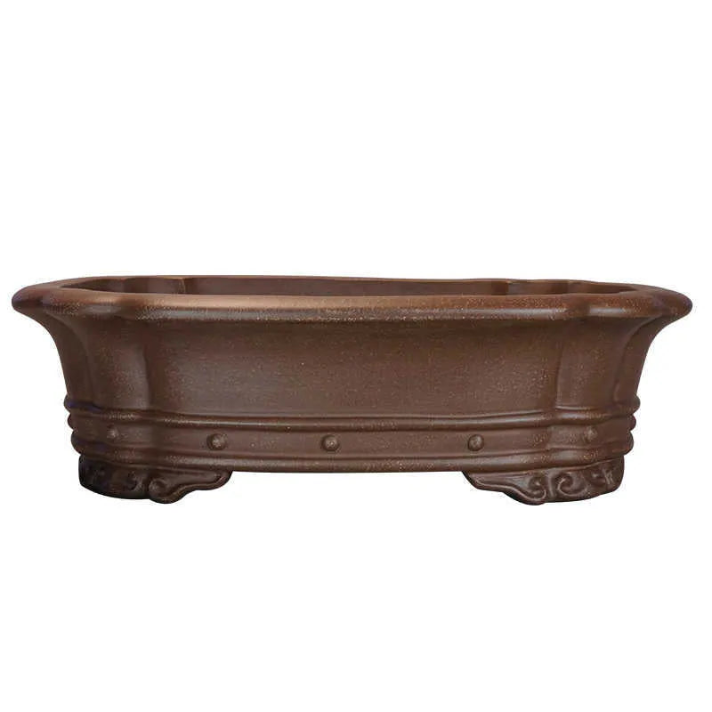 Purple sand handmade rectangular begonia flower pot measuring 51x41x14cm on desktop