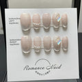 Women's false nails with blush colour and 14-short ladder pattern, showing four size options