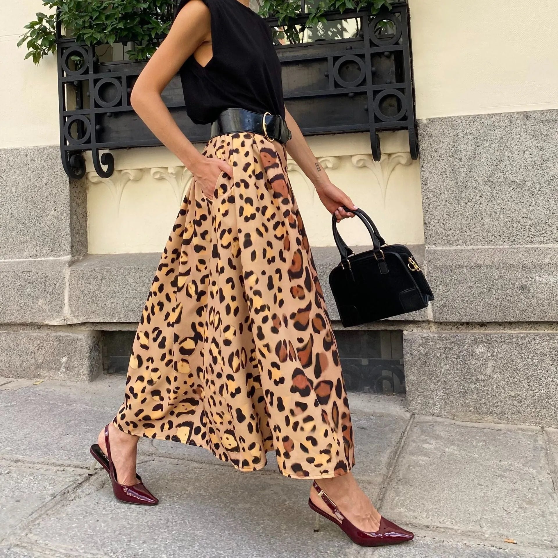 Brown leopard print women's A-line skirt with big hem design