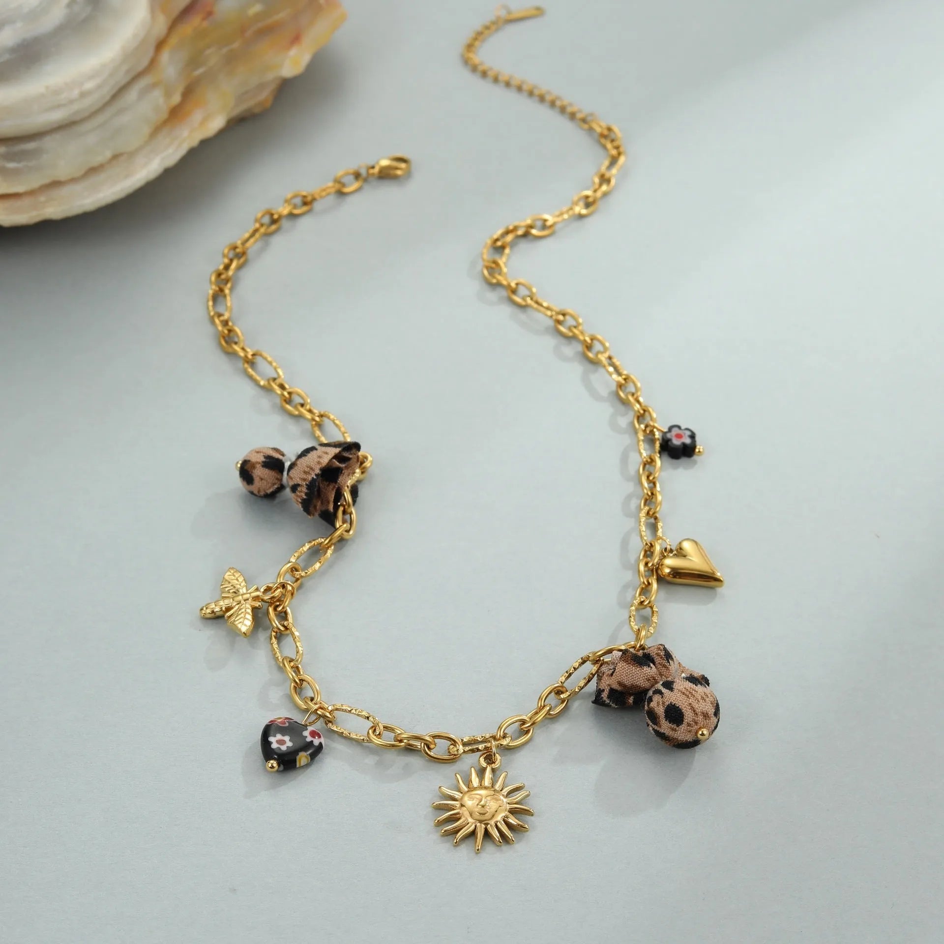 Geometric leopard pendant necklace with love hearts and flowers on adjustable stainless steel chain