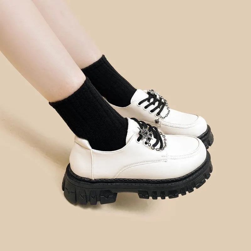 Women's preppy style loafers with metal cross shoulder straps in Duke Asterism colour