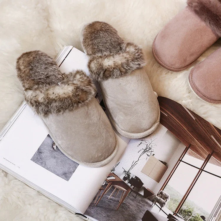 Couple wearing warm beige suede wool slippers with non-slip rubber sole indoors