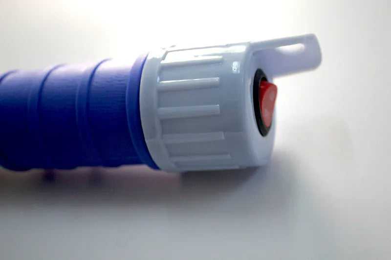 Blue and red manual hand siphon pump for transferring fuel, oil and water