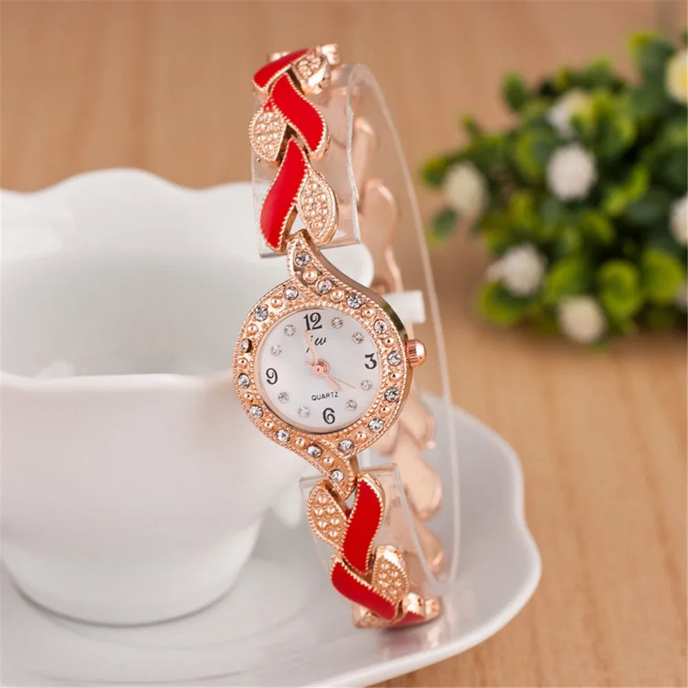 Women's love strap diamond watch with matching earrings, ring, and necklace in black suit option