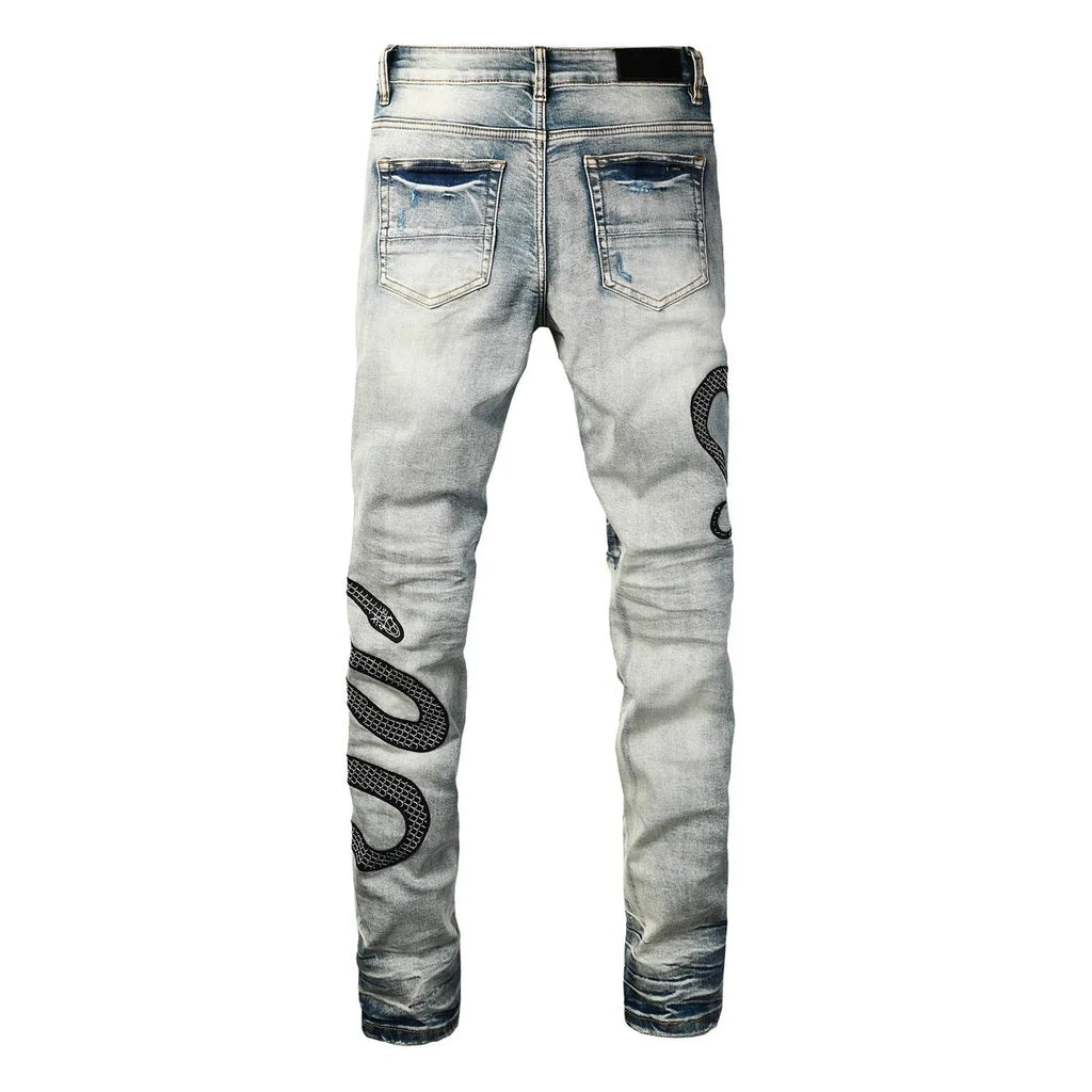 8934Blue distressed skinny jeans with a retro wash and button fly on a mid waist