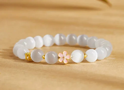 Sterling silver character fu bag bracelet with cold enamel peach blossom opal, flower shape, Gray Island Peach Blossom style, on white background