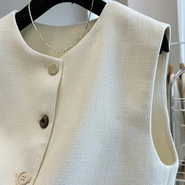 French style bandage vest for women with round neckline and sleeveless design in milky white colour