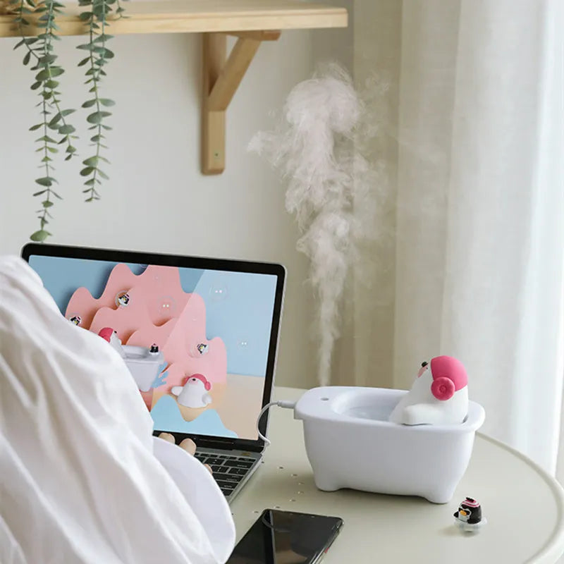 White USB air humidifier with 550ml water tank on a desk