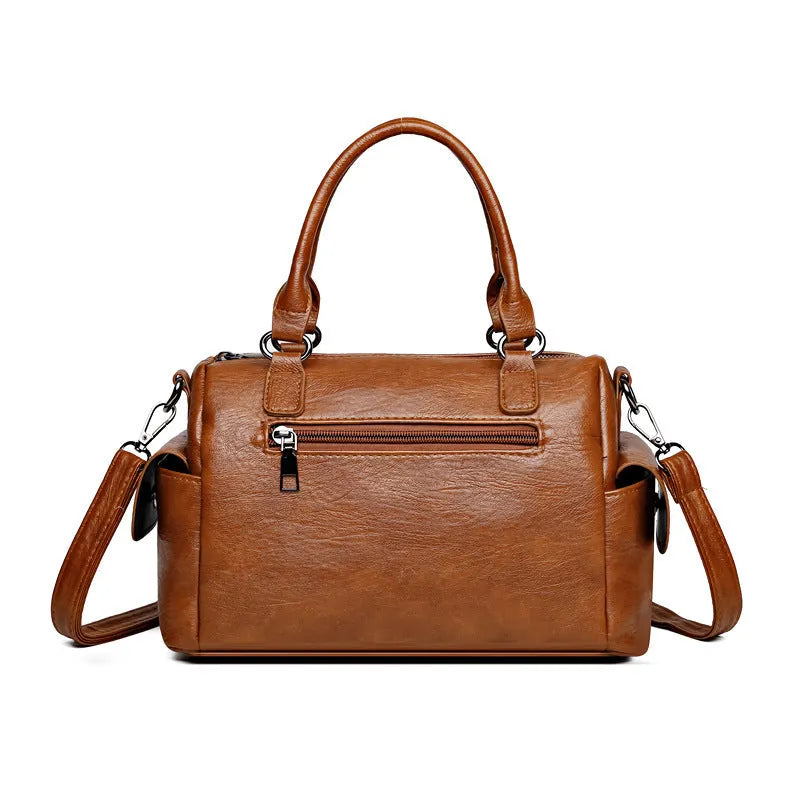 Large vintage messenger bag in horizontal square shape with contrast stitching, shown in available colour options