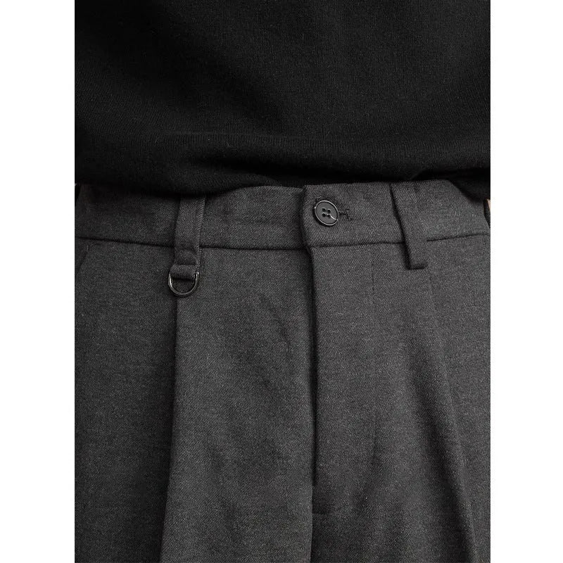 Men's straight-fit polyester trousers in dark grey, laid flat showing waistband and leg cut.