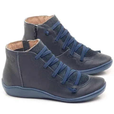 Women's casual flat ankle boots with wedge heel and round toe in leopard print colour.