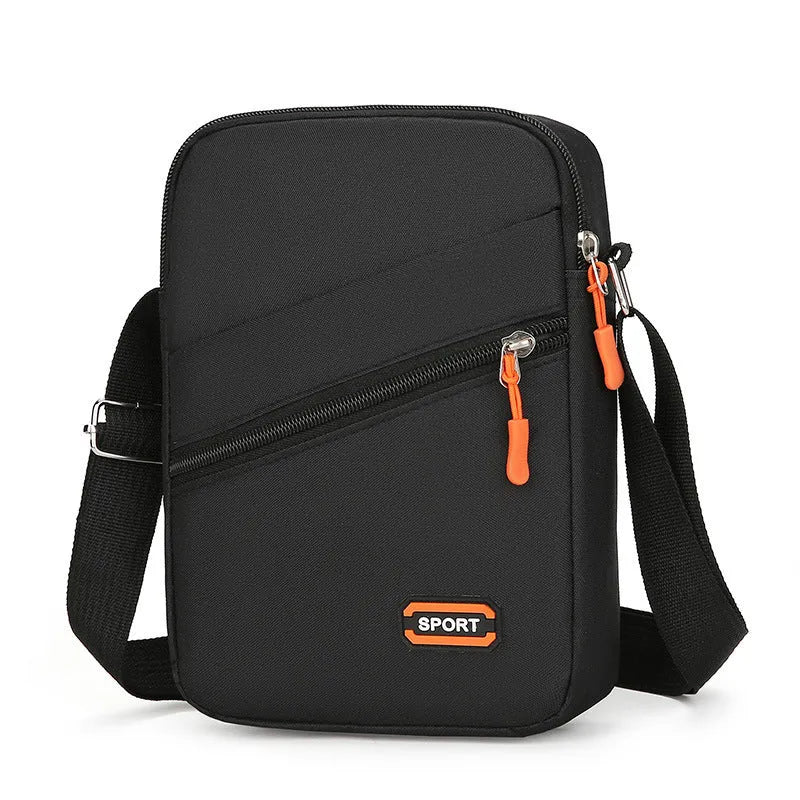 Ultra-light Oxford cloth crossbody commuter bag in black, navy blue, or silver grey with contrast colour detailing.
