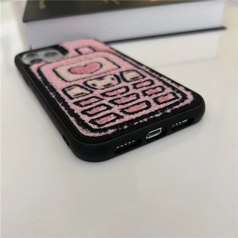 Pink towel embroidered TPU back cover case for iPhone on a table