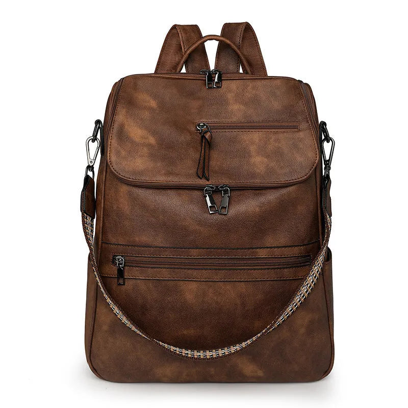 Retro college students backpack with curved shoulder straps in six colour options including black, blue, and yellow apricot