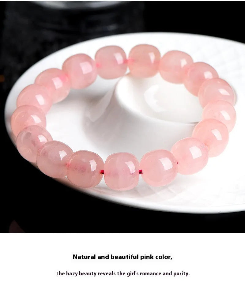 Pink crystal barrel bead bracelet with geometry design on wrist