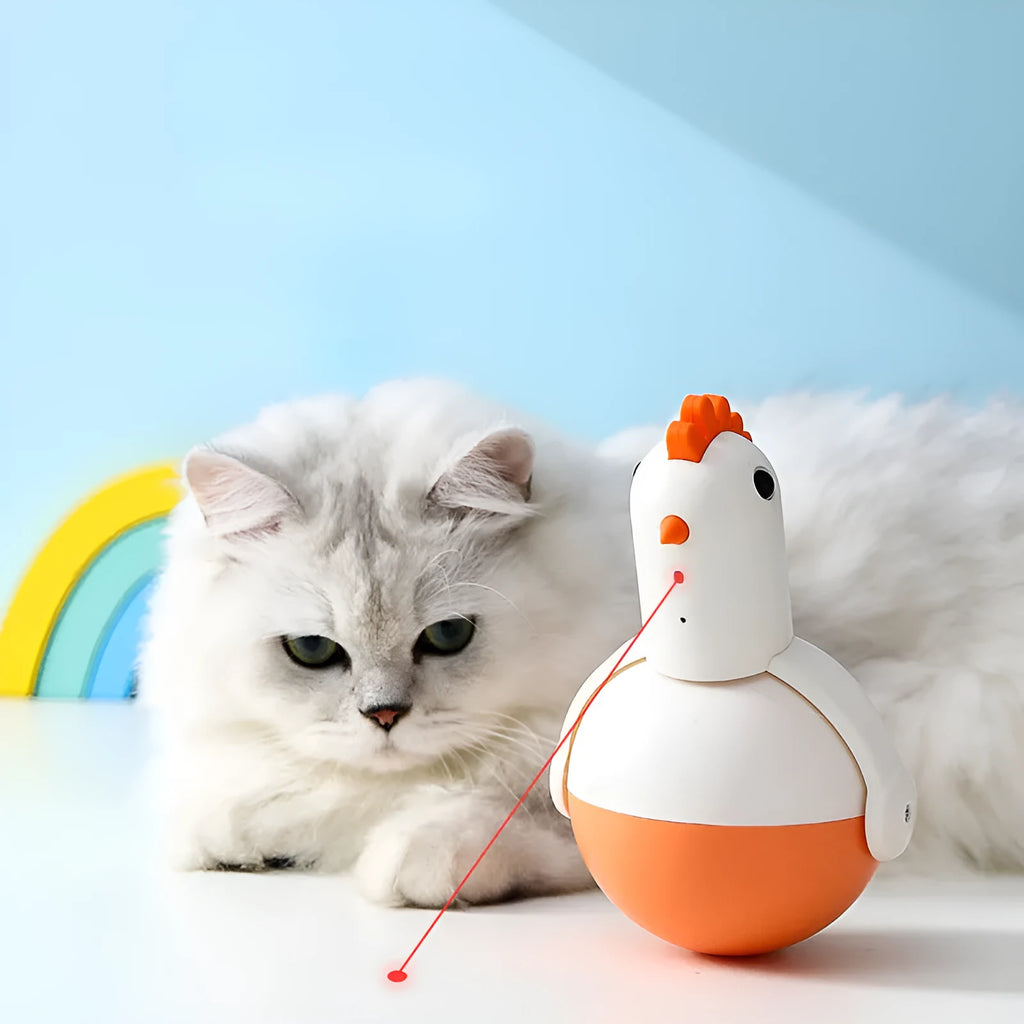 Green or orange electric cat toy chicken with laser and sound features on a flat surface.