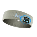 Bluetooth sports headband in black colour with removable washable fabric and wireless audio functionality