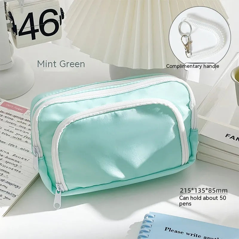 Double layer pencil case in blue with gift handle showing 215mm length 135mm width 85mm depth dimensions