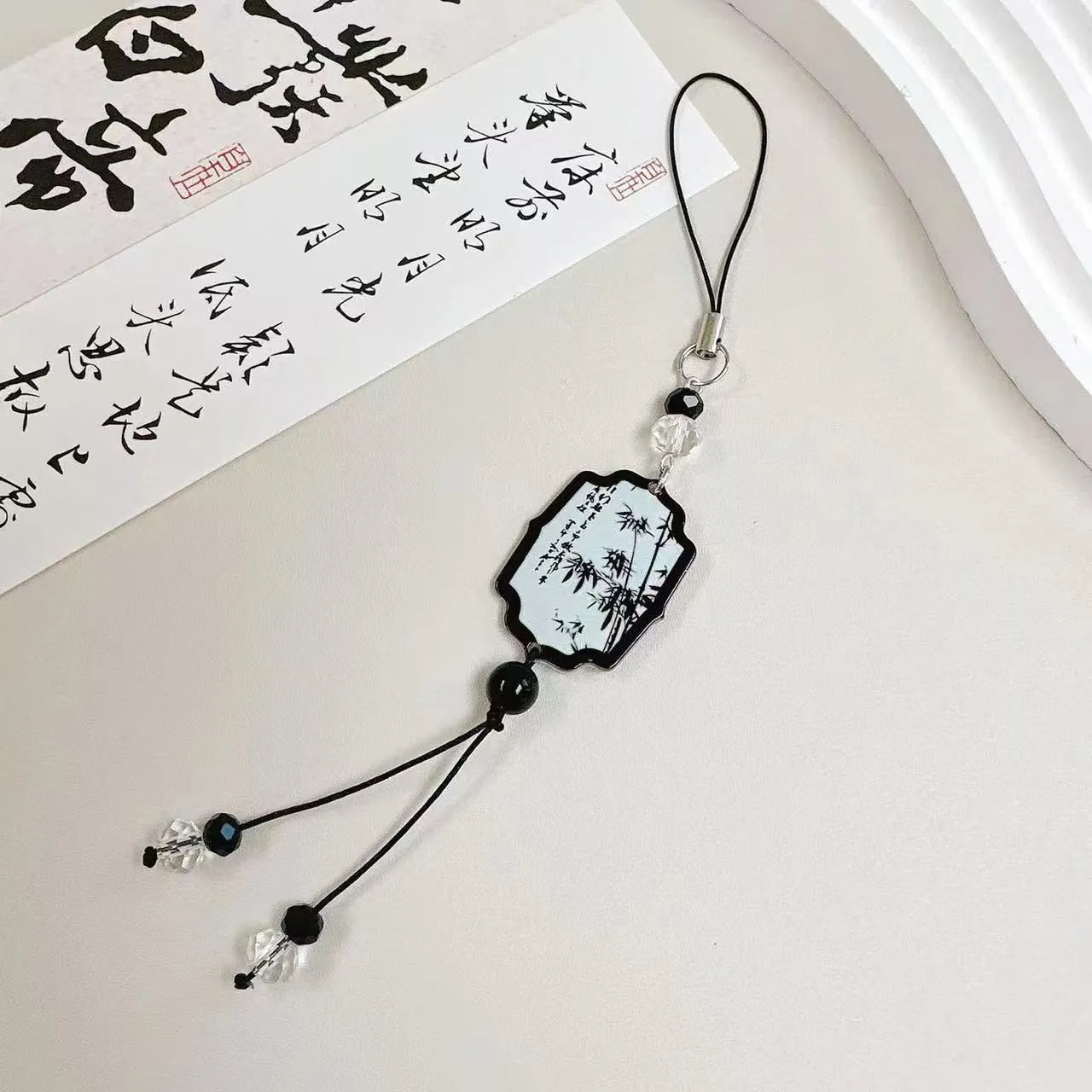 Guofeng Chinese style bead pendant keychain with plants and flowers pattern.