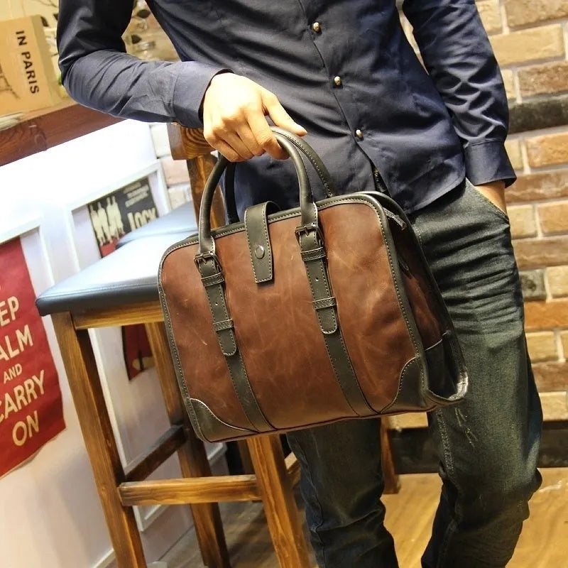 Men's cowhide leather handbag in black with zipper closure and hard handle